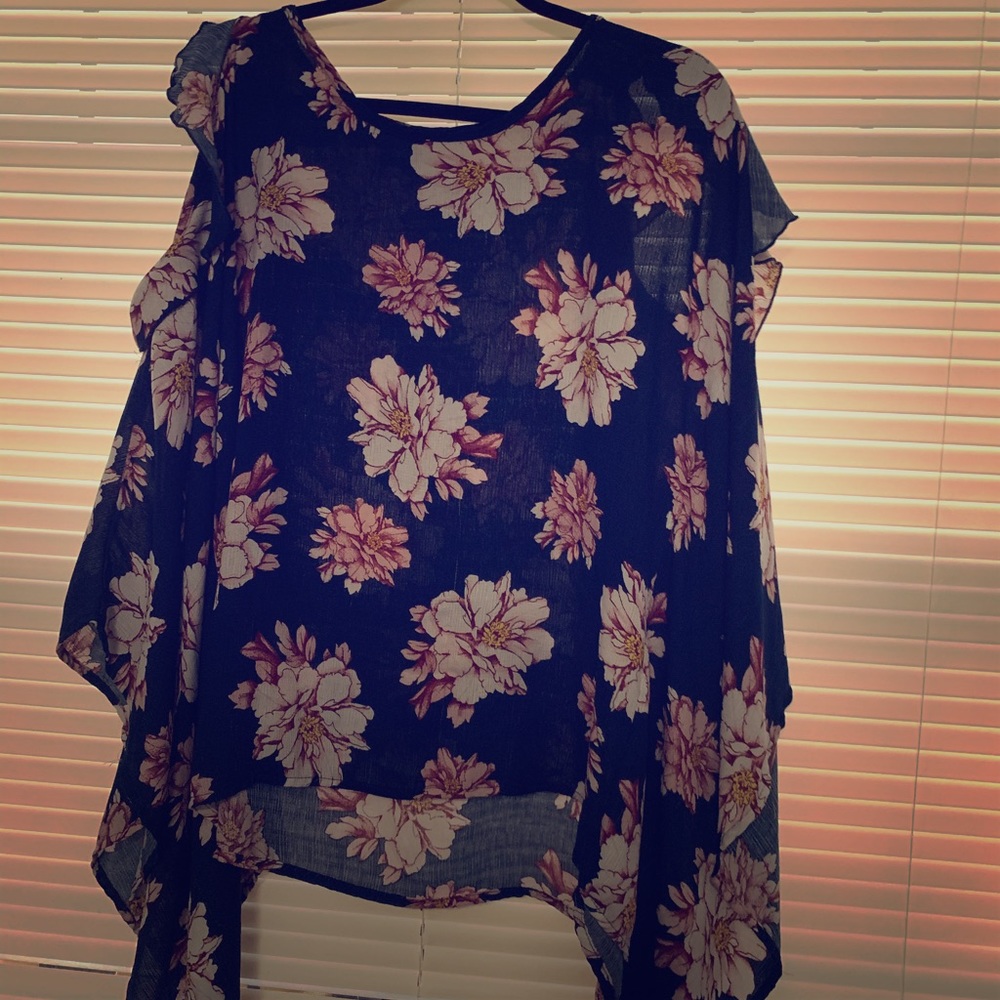 Blue blouse with flowers.